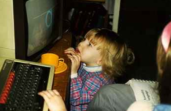 Photo of a child using a computer